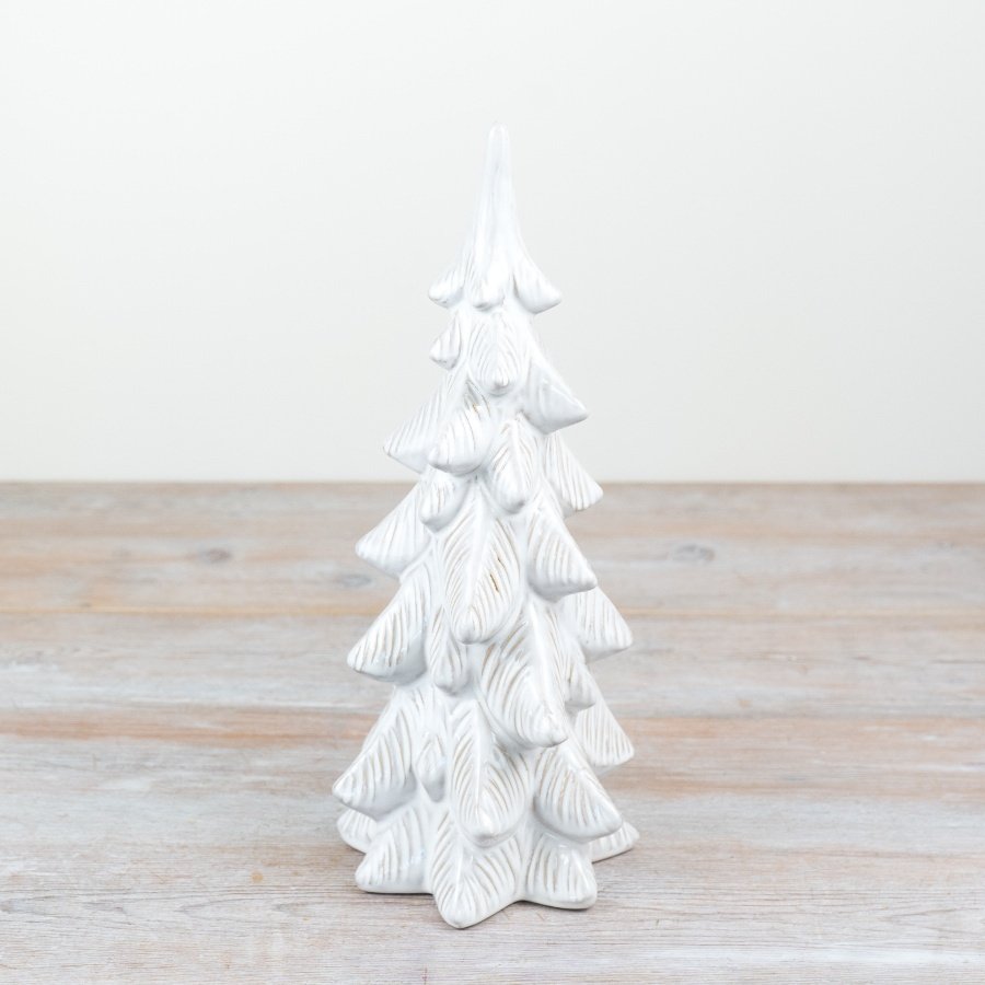 Upgrade any room with our stylish porcelain tree- Perfect decor for adding elegance to your home.