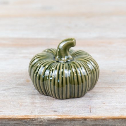 Add a touch of elegance to your autumn decor with our beautiful green porcelain pumpkin