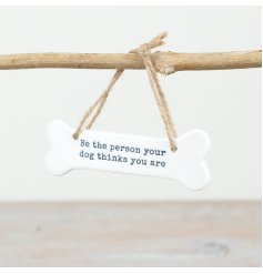 Add some canine inspiration to your home decor with our charming 'Be the Person You Dog Thinks You Is' bone hanging