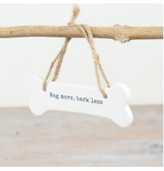 white hanging bone sign for dogs