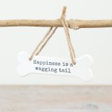 a white bone shaped doggy sign 