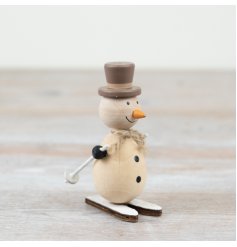 Add a touch of festive charm to the home with this delightful wooden snowman