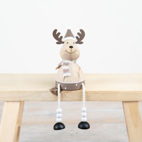 A charming wooden reindeer sitter, featuring delightful metal antlers and a sweet smile. T
