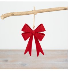 A gorgeous, on-trend red bow complete with a gold string hanger