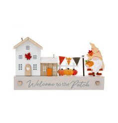 Get ready to add some magic to your home decor this season with our charming wooden house deco