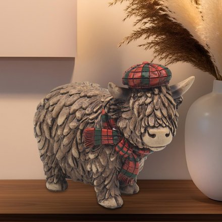 Inspire your decor with the allure of Scotland with our Single Standing Highland Cow figurine.