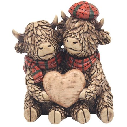 Highland Cows With A Heart Ornament