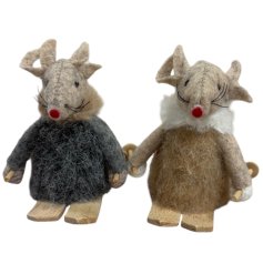 A neutral assortment of two festive mice both sat on ski's