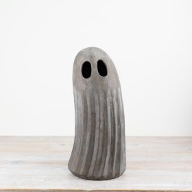 "Spice up your decor with this chic ghost figurine. Its charmingly spooky design is perfect for adding some personality 