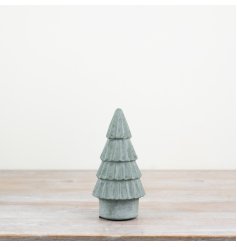 Lively small tree decoration adorned with green hues and delicate detailing