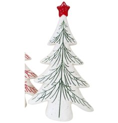 A simple green and white Christmas tree ornament covered in dainty green flecks.