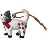 A colourful Christmas tree decoration in the design of a festive cat. 
