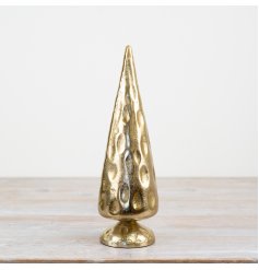 A rustic and simple gold tree ornament with a hammered effect finish.