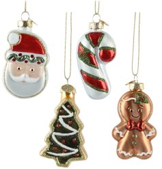 A mix of 4 Christmas ornaments made from glass. Each is designed like a festive cookie and has glitter detailing. 