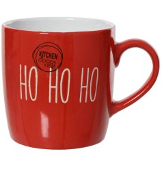 A bright red festive mug with bold white HO HO HO text.