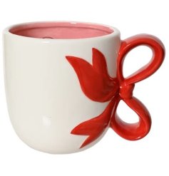 "Add a touch of timeless elegance to your mornings with our Mug Dolomite Round Bows. 