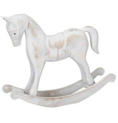 A vintage inspired wooden rocking horse with a white washed, distressed finish. 