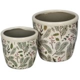 A set of 2 planters, each with an attractive red berry and green foliage pattern. 