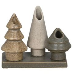 A sculptural collection of tree shaped vases set upon a base plate. In a mix on natural hues with an earthy finish. 