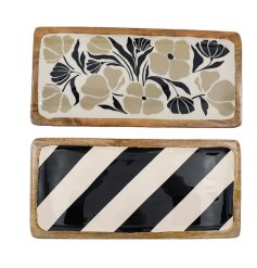 An assortment of 2 mango wood trays each with a bold and beautiful monochrome design in stripe and floral prints