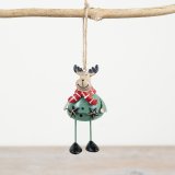 Add some charm to your holiday decor with this metal reindeer hanger and rustic star garland.