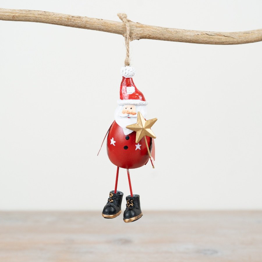 Add a touch of festive charm to your collection with this delightful metal Santa hanger. 