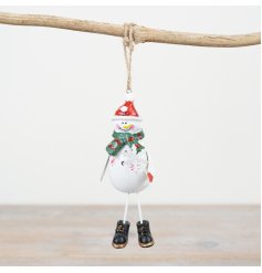 Add a touch of festive charm to your Christmas collection with this delightful metal snowman hanger.
