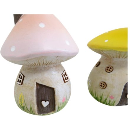 A whimsical mushroom made from ceramic in 2 assorted designs. 