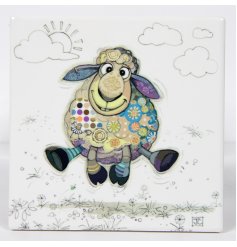 A ceramic coaster with sasha sheep by Bug Art decal.
