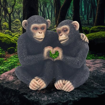 Meet the adorable monkeys on this charming twin heart ornament. A delightful addition to any decor