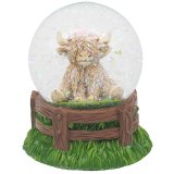 add some scottish flair with this highland cow glitter globe 