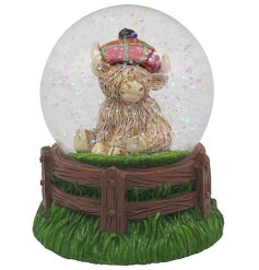 Elevate your home with our whimsical Highland Cow Tartan Cap Waterglobe - the perfect touch of Scottish charm.