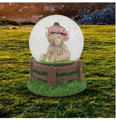 Add a touch of Scottish whimsy to your home with our new Highland Cow Tartan Cap Waterglobe. 