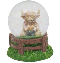 Capture the charm of Scotland with the Highland Cow Heart Waterglobe, a captivating addition to your home decor 