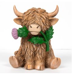 Add a touch of the Scottish countryside to your home with our delightful Highland Cow and Thistle Ornament.