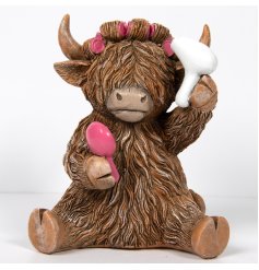 Channel the beauty of the Scottish Highlands with our charming Highland Cow Hairdo Ornament. 