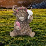 Channel the beauty of the Scottish Highlands with our charming Highland Cow Hairdo Ornament. 