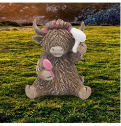 Channel the beauty of the Scottish Highlands with our charming Highland Cow Hairdo Ornament. 
