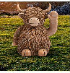 Welcome a touch of Scottish cuteness with the Waving Happy Highland Cow! 