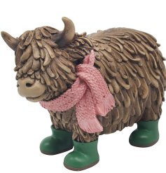Adorable highland cow figurine adorned with charming wellies, perfect for any collection!