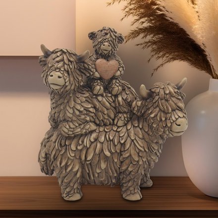 Add some Scottish charm to your home with the Hughie Highland Cow Family - a must-have for any animal lover.