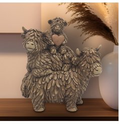 Add some Scottish charm to your home with the Hughie Highland Cow Family - a must-have for any animal lover.