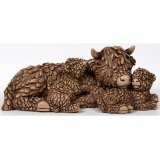 Meet Hughie and his adorable babies, the perfect addition to any highland cow fan's home decor