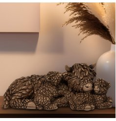 Meet Hughie and his adorable babies, the perfect addition to any highland cow fan's home decor