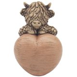 Fall in love with Hughie Highland Cow W/heart, the cutest addition to your home decor
