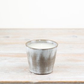 Bring elegance & warmth to your home with our Ceramic Pot & Wax Candle. 