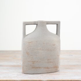 Gorgeous vase with one-of-a-kind handles, boasting a beautiful natural tone. 