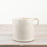 Add vintage charm to your home with our stunning White Ceramic Jug. 