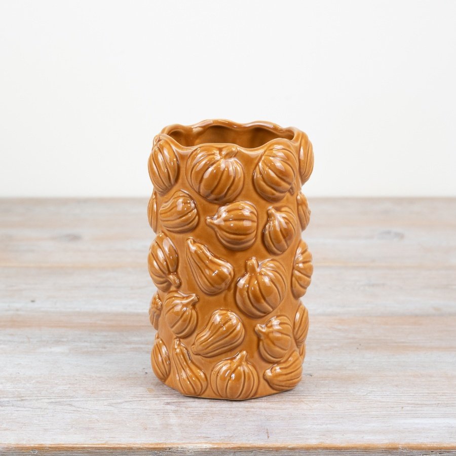 Celebrate fall's splendor with our lovely ceramic pumpkin planter