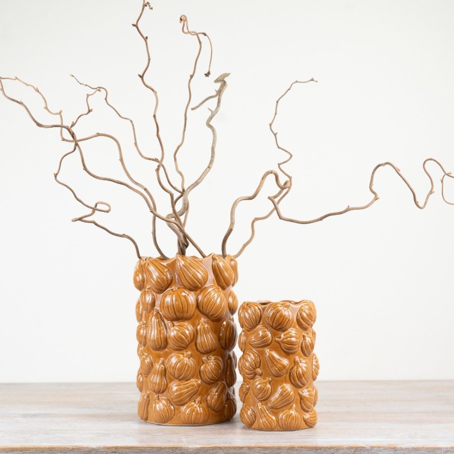 Celebrate fall's splendor with our lovely ceramic pumpkin planter